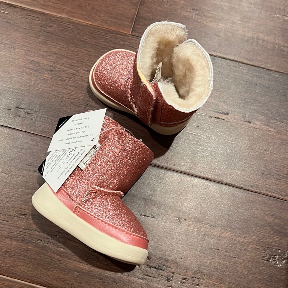 Never worn pink sparkly baby Uggs